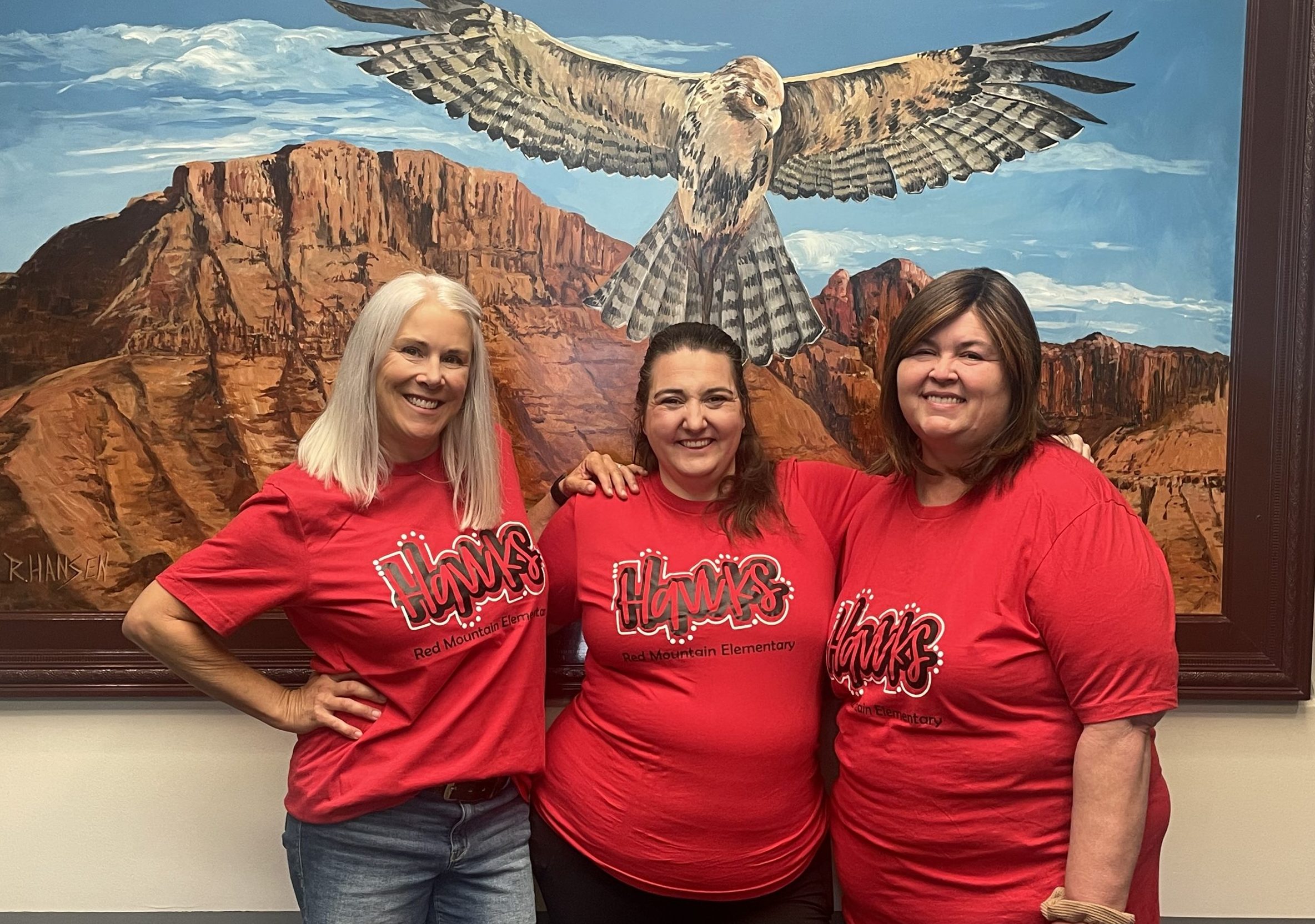 Three women standing together