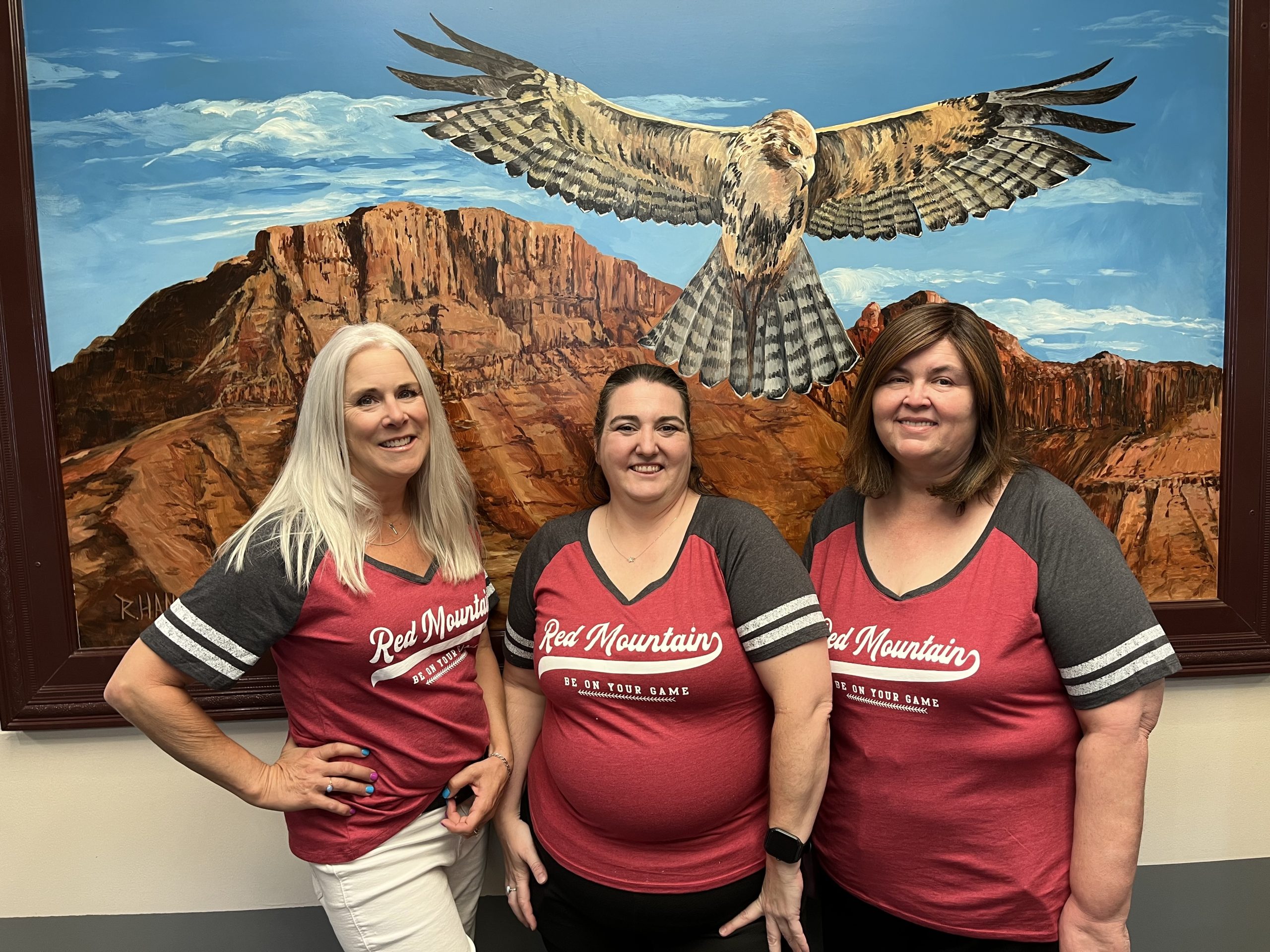 Three women standing together