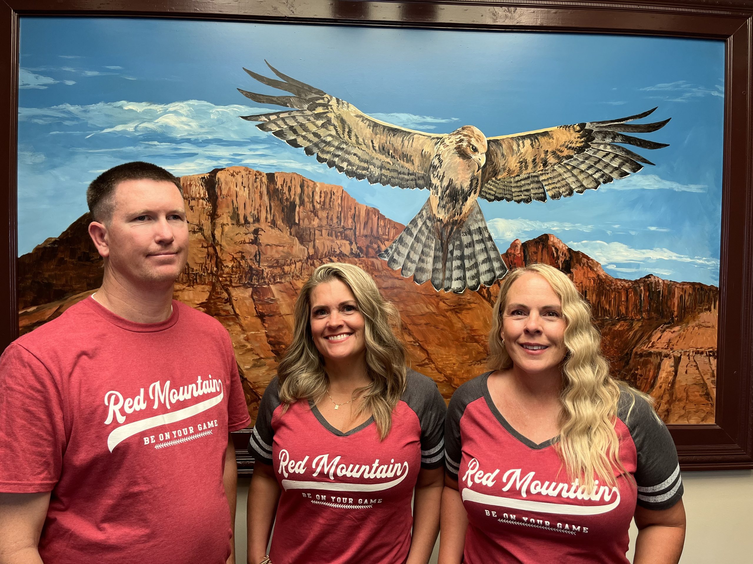 Administration wearing school shirt.